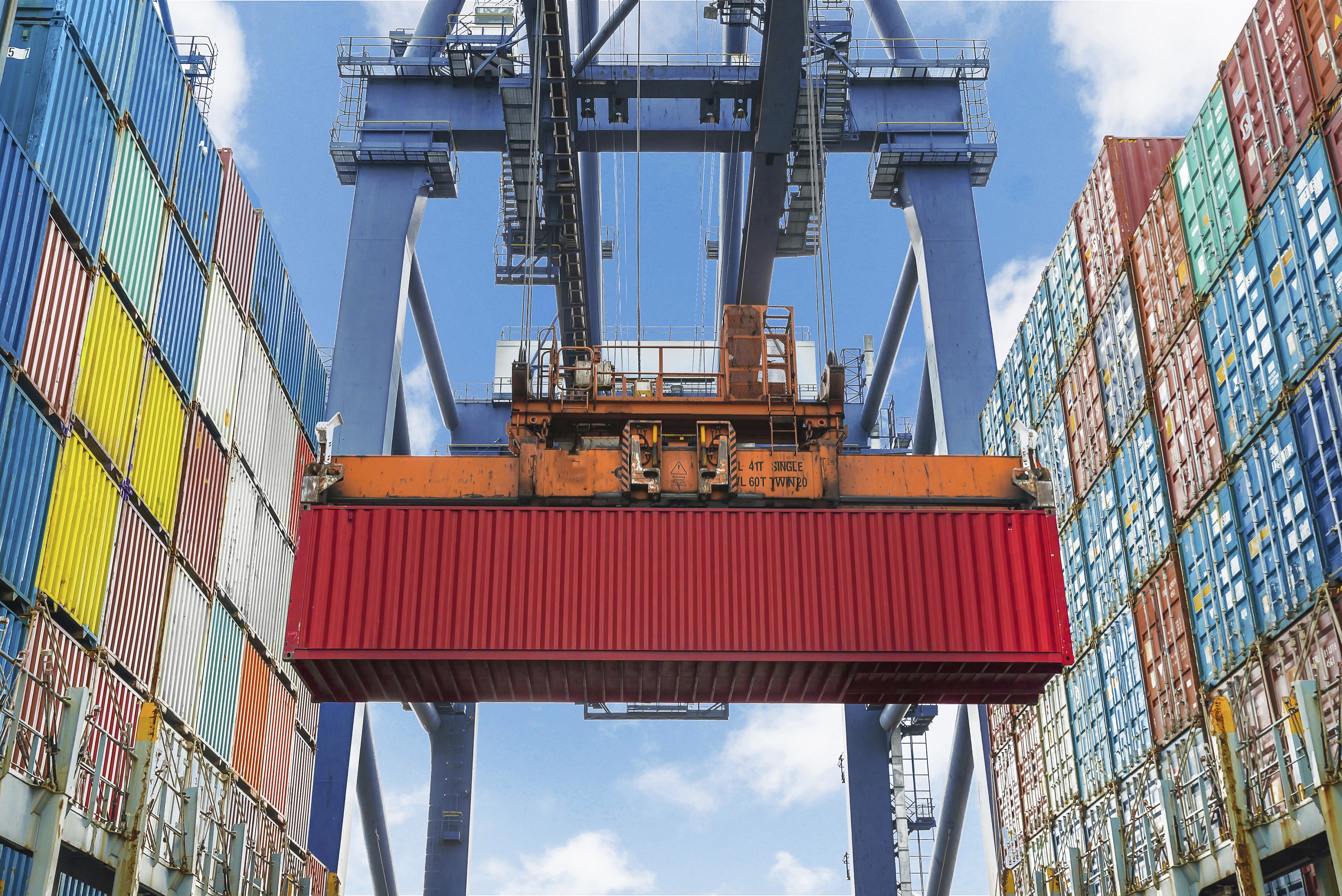 shore-crane-lifts-container-during-cargo-operation-in-port-bcs-placement